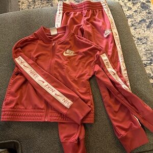 Nike youth girls medium pink  track suit worn a few times
